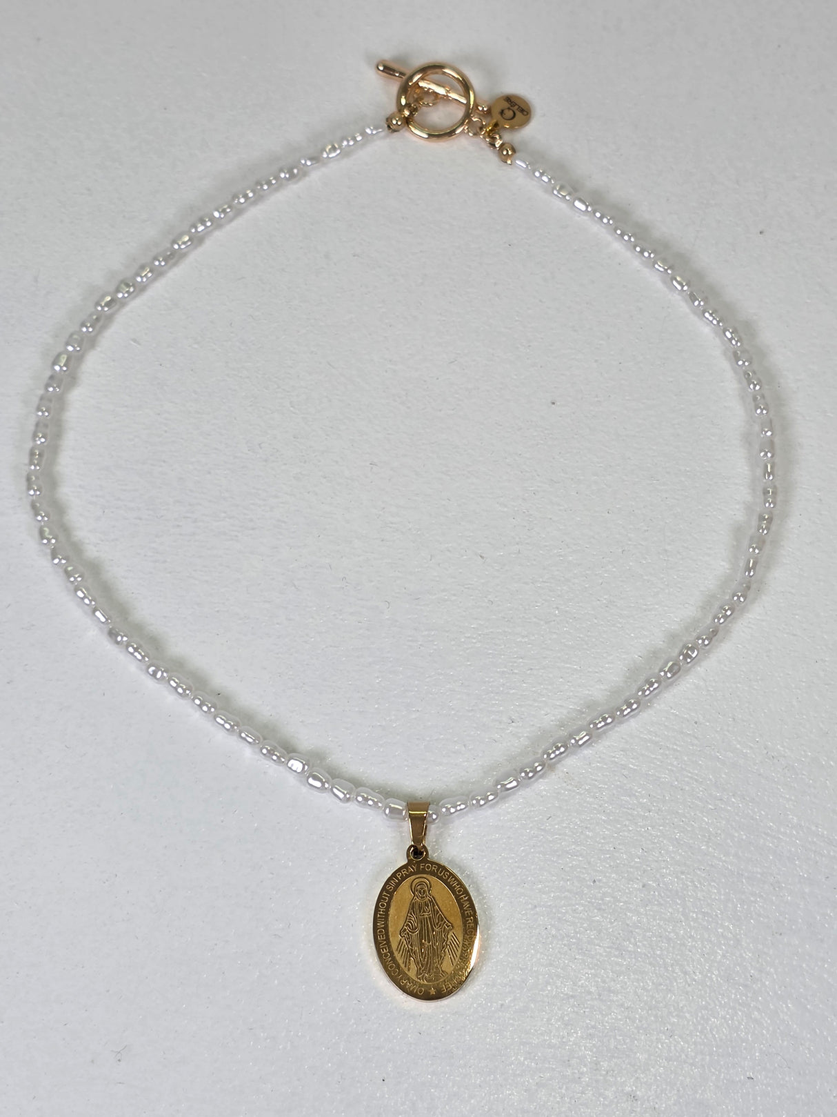 Imitation Pearl Necklace with Oval Sacred Medal