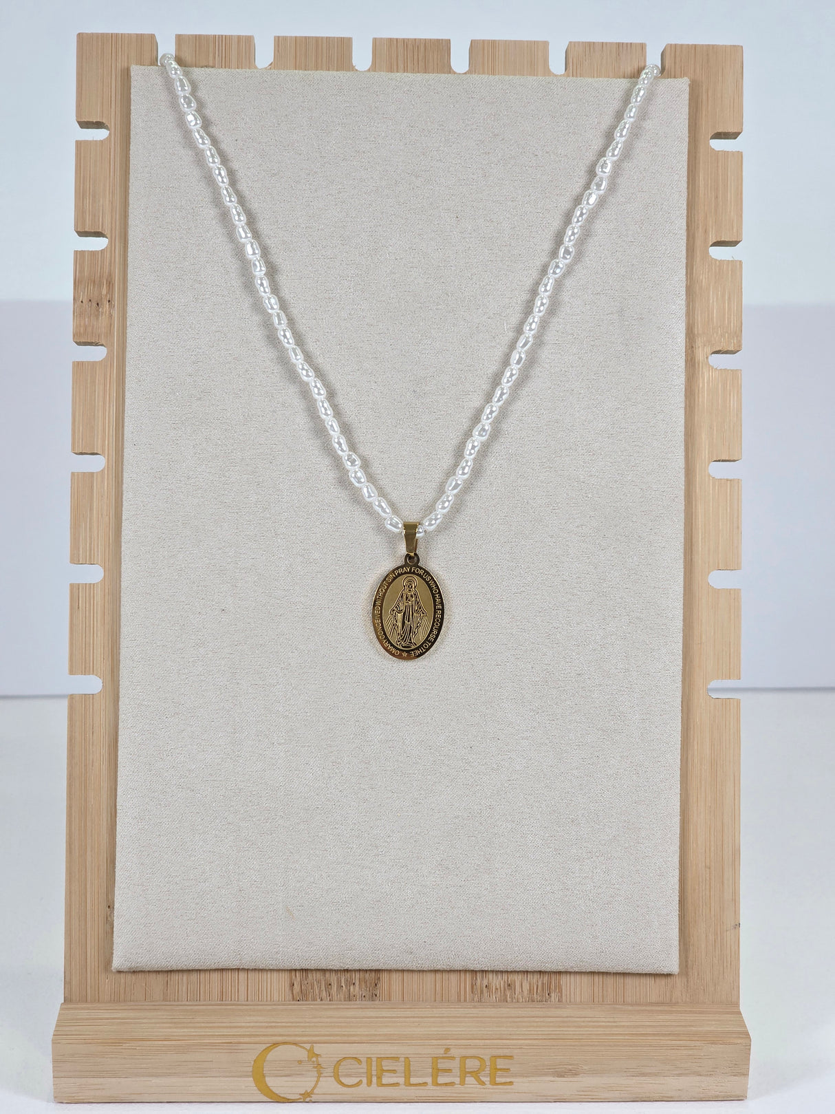 Imitation Pearl Necklace with Oval Sacred Medal